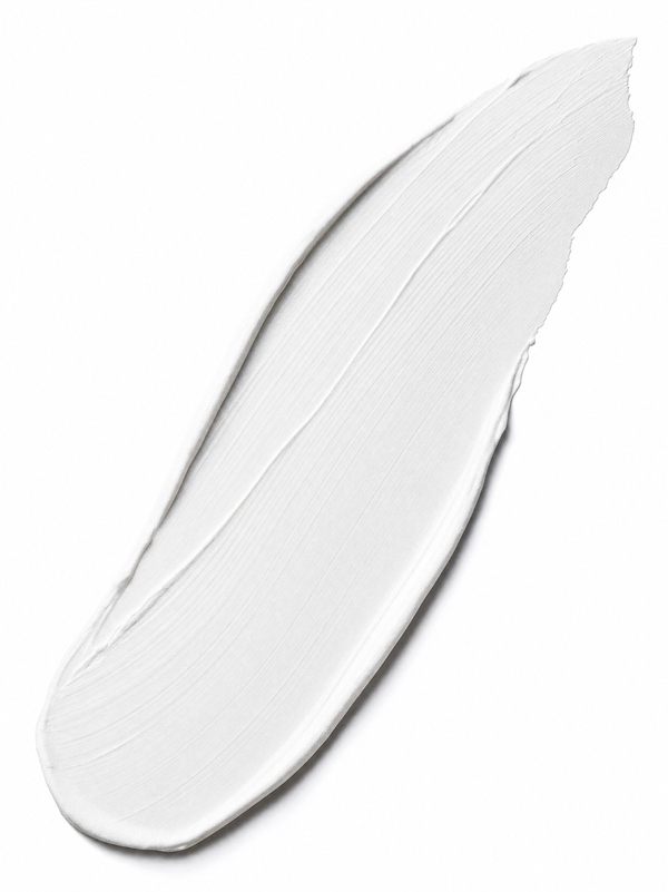 Immaculate Ultra Matte Velvety Touch Sunscreen texture swatch - matte white sunscreen lotion swiped on a white surface