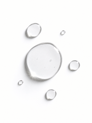 Immaculate Salicylic Acid 2% Face Serum texture swatch - clear watery serum droplets on a white surface