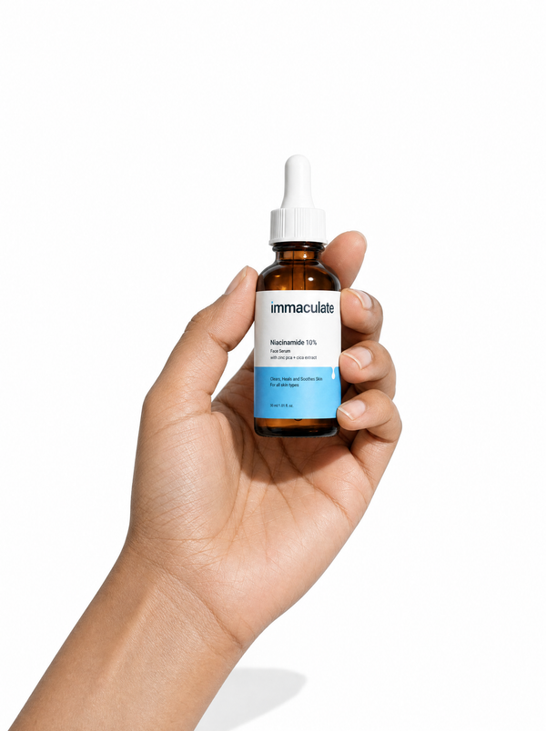 Hand holding the Immaculate Niacinamide 10% + Zinc Face Serum, showing its size and everyday form
