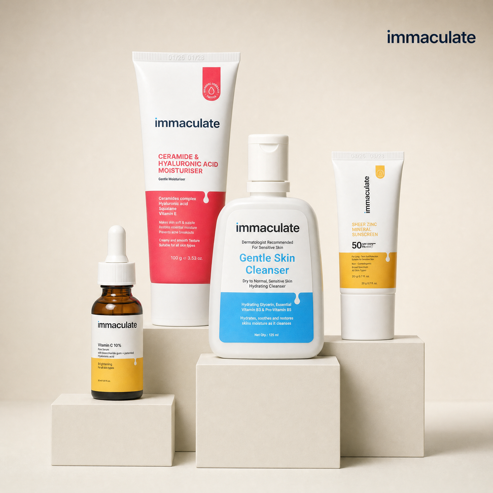 The Immaculate Travel Kit — travel-size skincare set on a neutral studio set